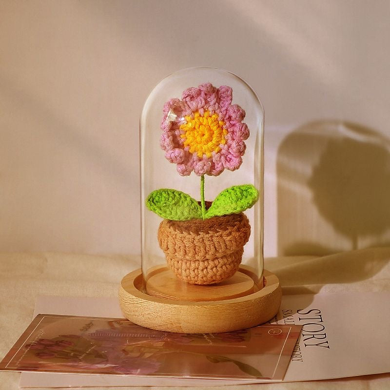 knitted potted plant with glass cover