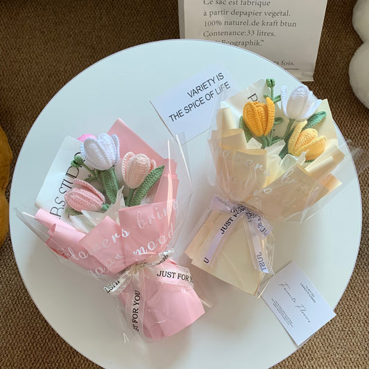 Handwoven small bouquet of blooming tulips