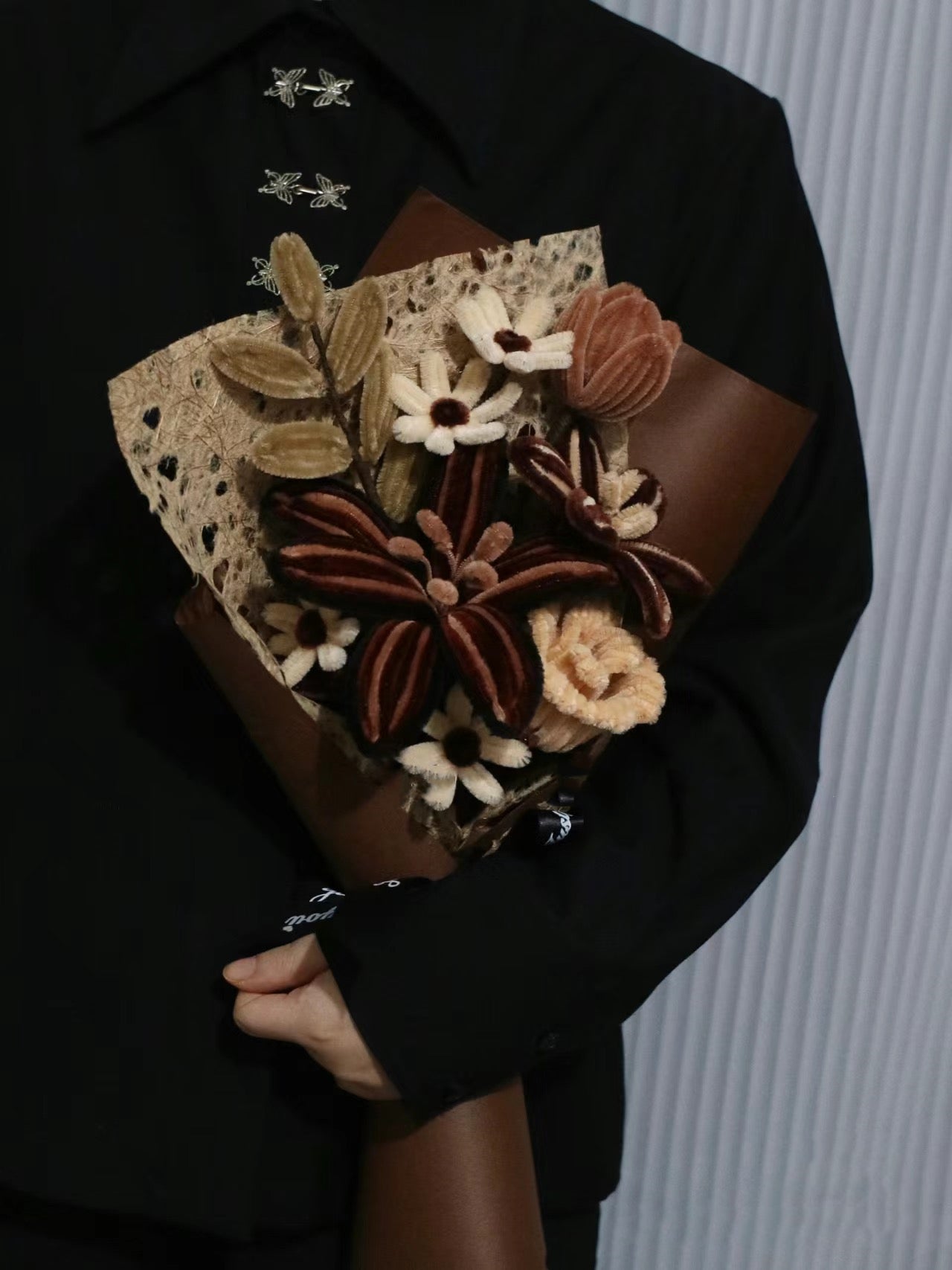 Homemade woven bouquet of twist stick roses