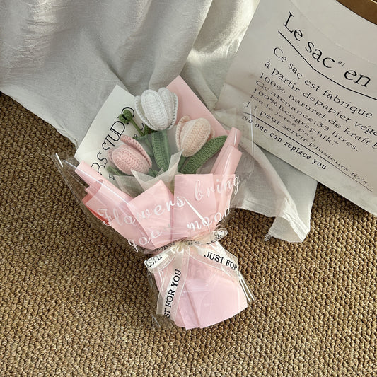 Handwoven small bouquet of blooming tulips