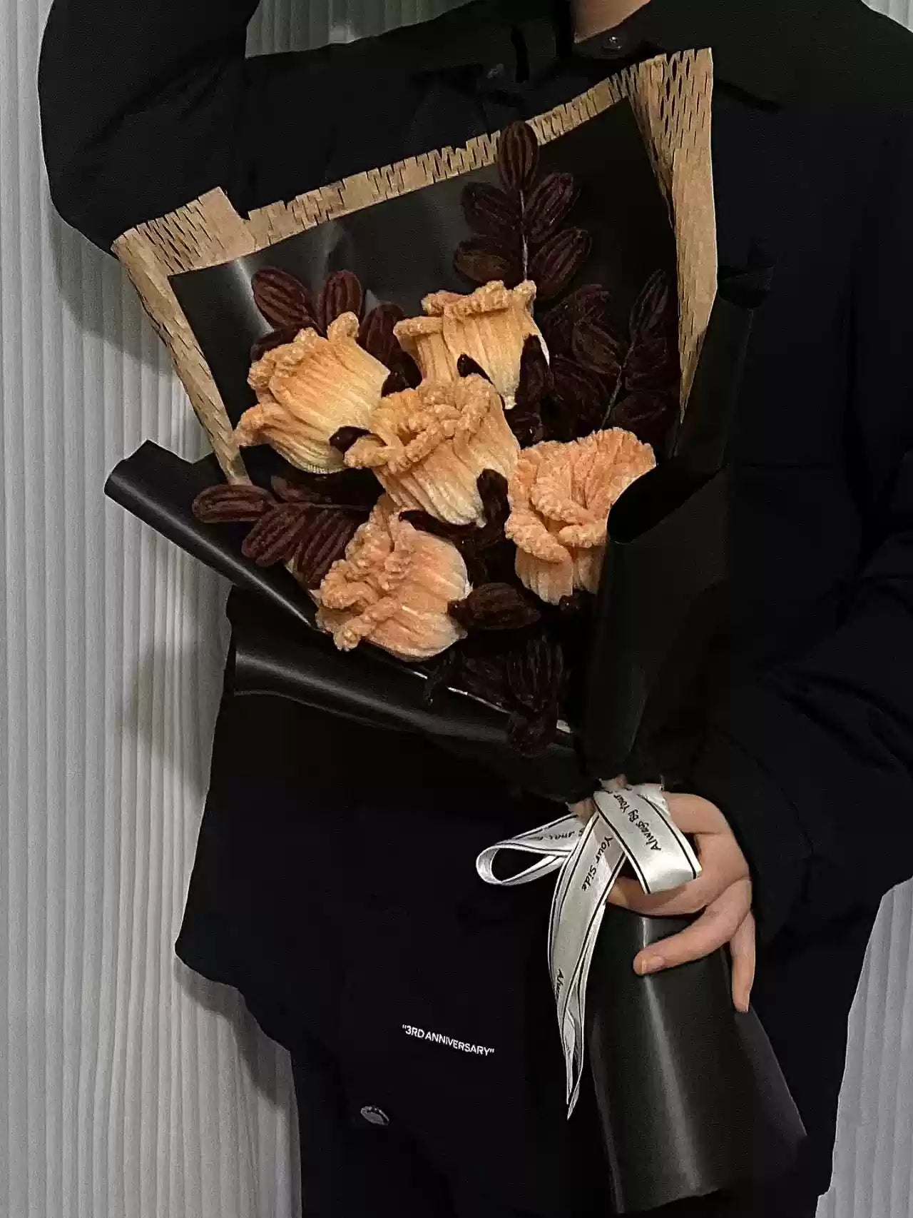 Homemade woven bouquet of twist stick roses