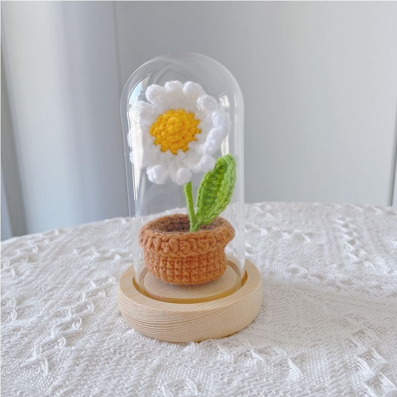 knitted potted plant with glass cover