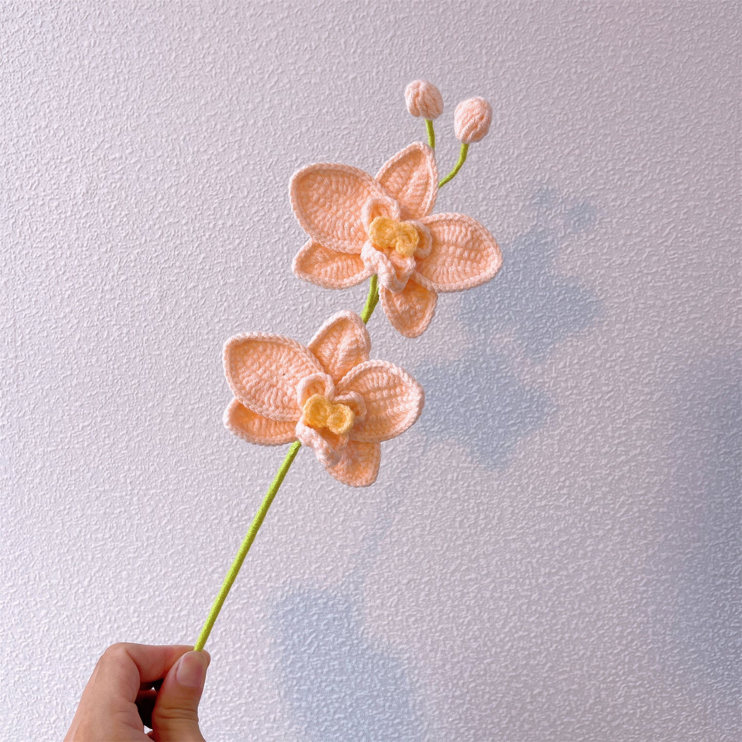 Hand-crocheted double-headed and three-headed phalaenopsis