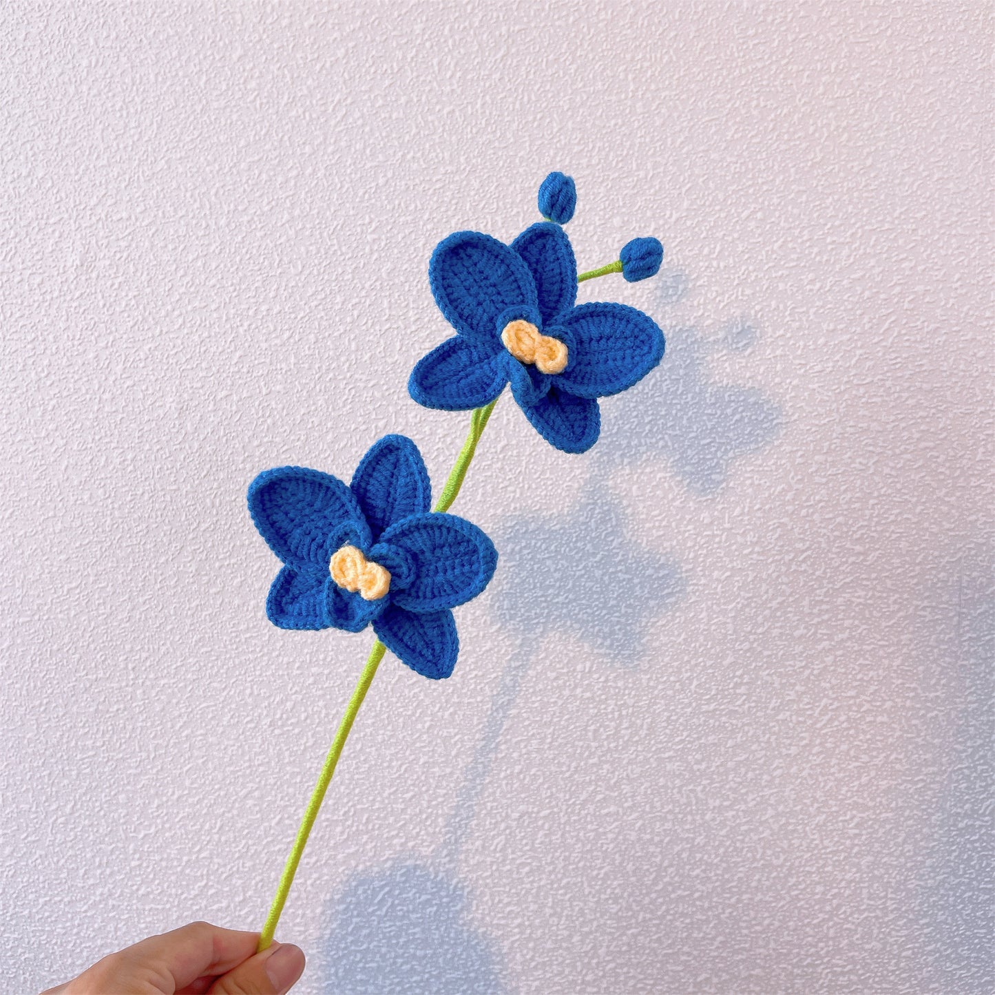 Hand-crocheted double-headed and three-headed phalaenopsis