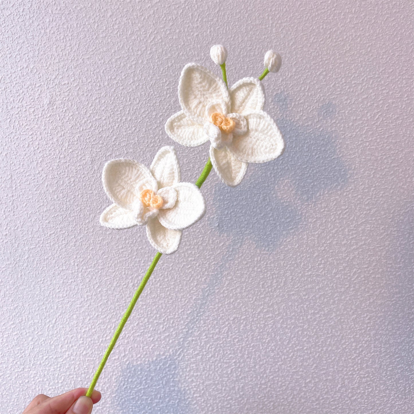 Hand-crocheted double-headed and three-headed phalaenopsis