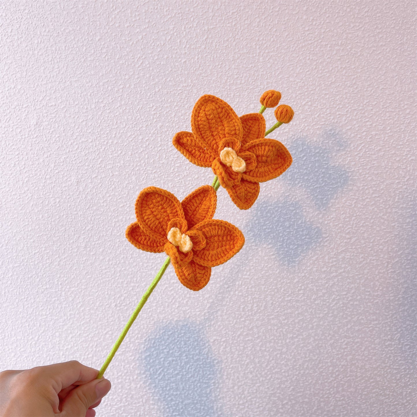 Hand-crocheted double-headed and three-headed phalaenopsis