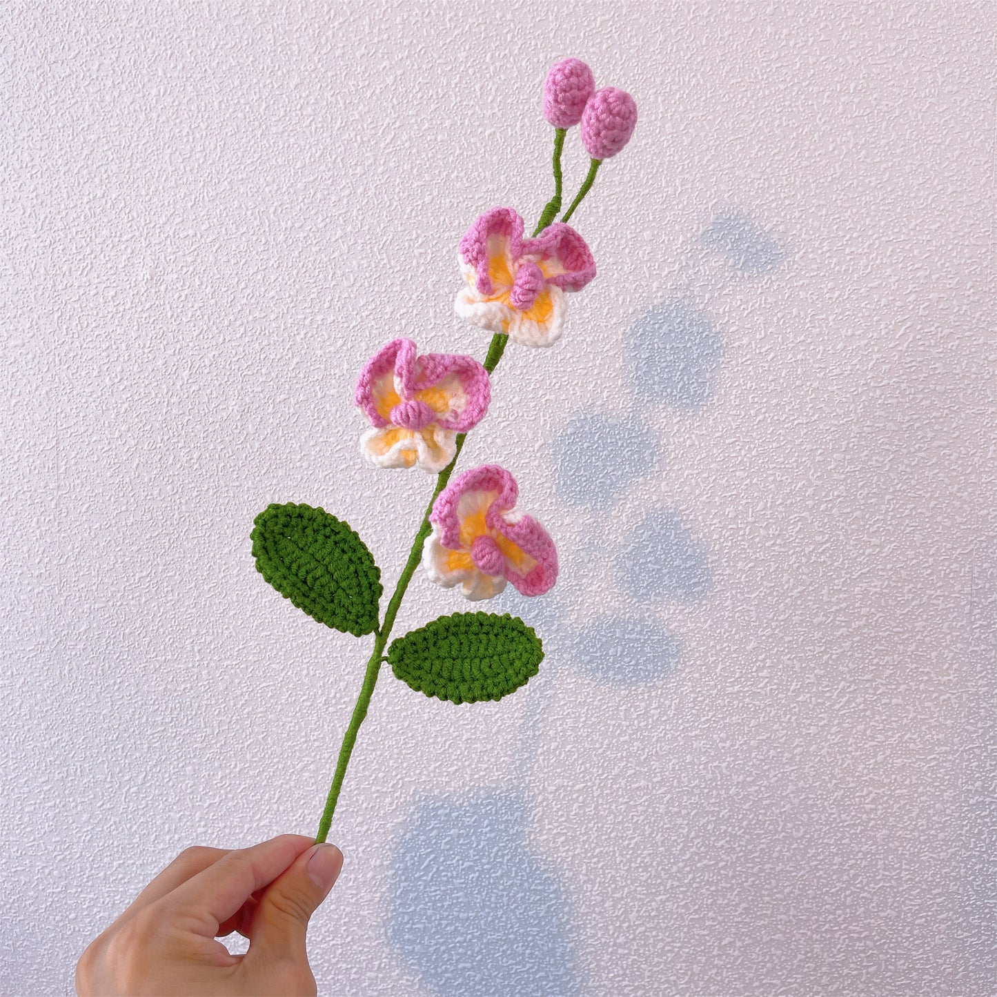 Hand-crocheted double-headed and three-headed phalaenopsis