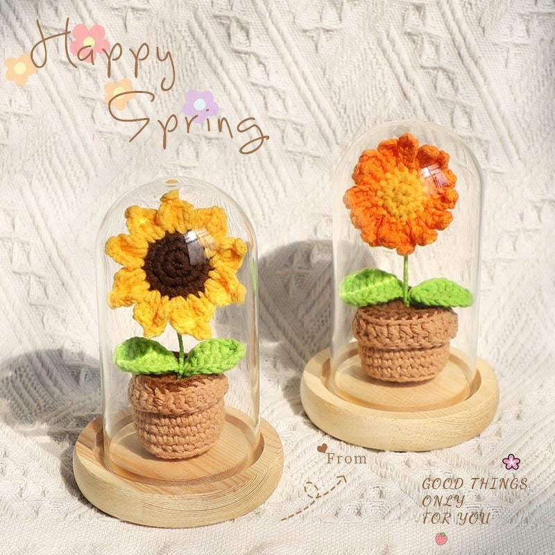 knitted potted plant with glass cover