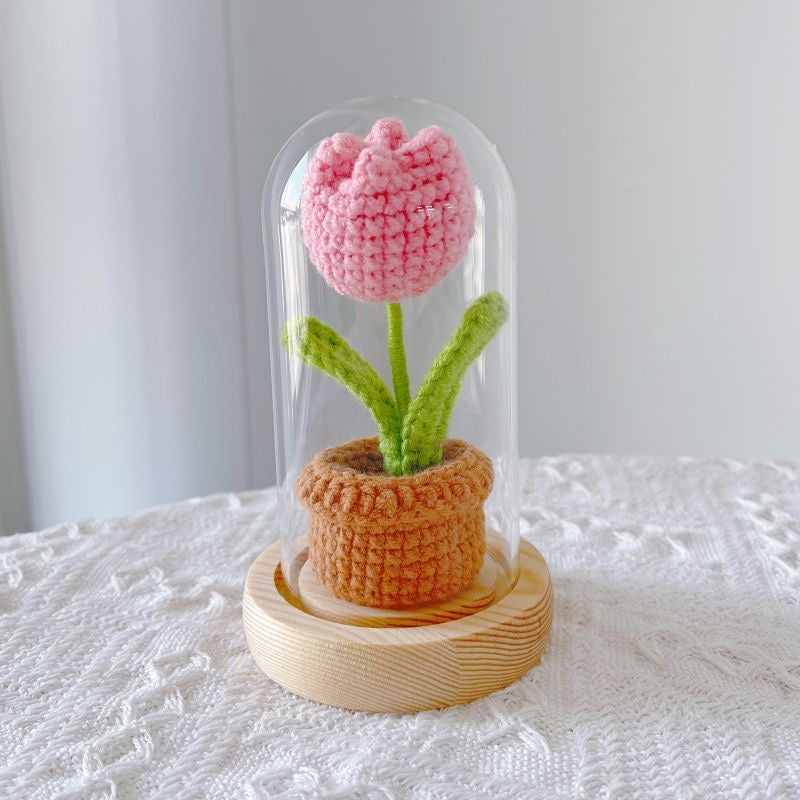 knitted potted plant with glass cover