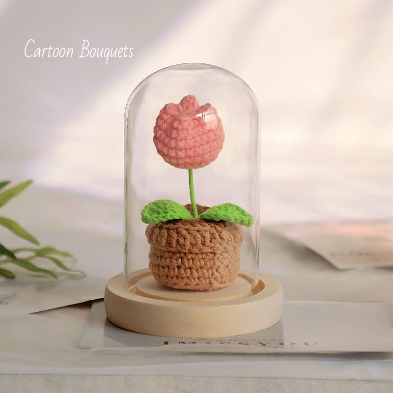 knitted potted plant with glass cover