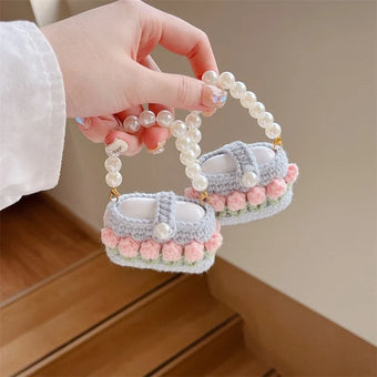 compare product Pink Tulip and Pearl Knitted Airpods Case