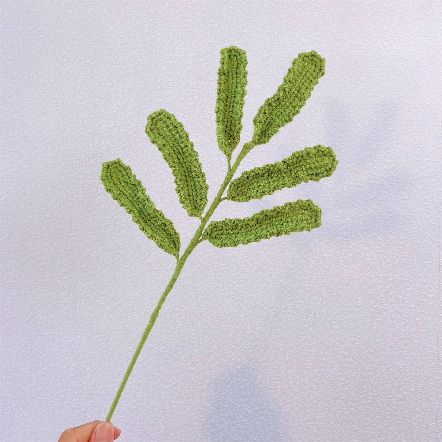 Handwoven daisy leaves