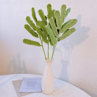 Handwoven daisy leaves