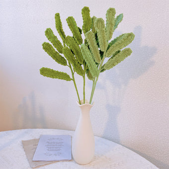 compare product Handwoven daisy leaves