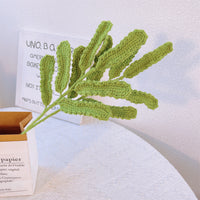 Handwoven daisy leaves