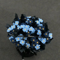 Handmade crocheted forget-me-not bouquet