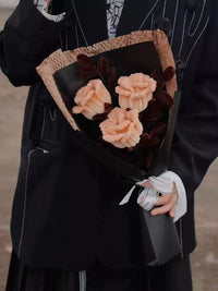 Homemade woven bouquet of twist stick roses