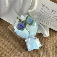 Handwoven small bouquet of blooming tulips