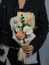 Homemade woven bouquet of twist stick roses