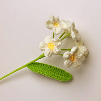Handwoven forget-me-not flowers