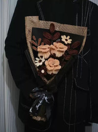 Homemade woven bouquet of twist stick roses