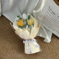 Handwoven small bouquet of blooming tulips