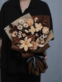 Homemade woven bouquet of twist stick roses