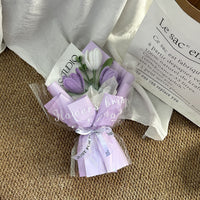 Handwoven small bouquet of blooming tulips