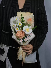 Homemade woven bouquet of twist stick roses