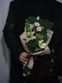 Homemade woven bouquet of twist stick roses