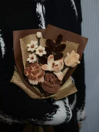 Homemade woven bouquet of twist stick roses