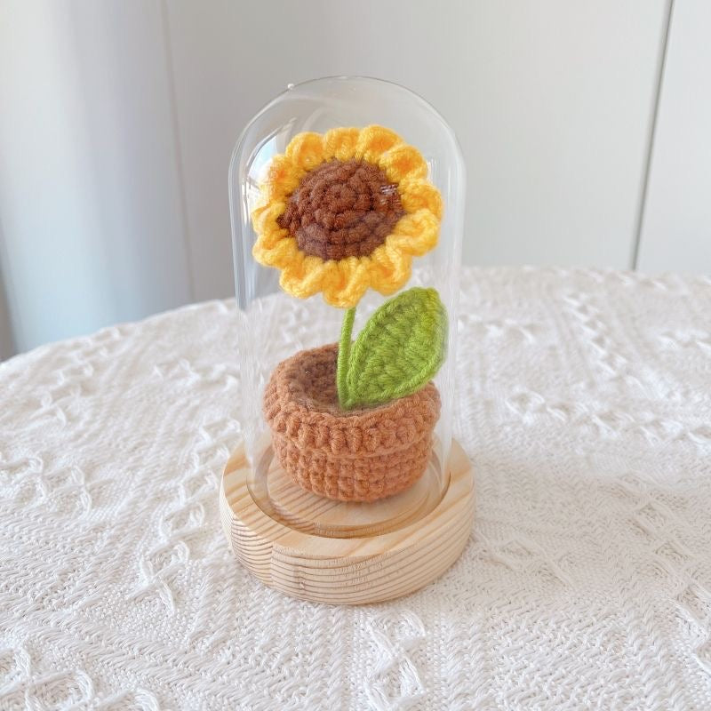 knitted potted plant with glass cover