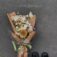 Sunflower and lily mixed bouquet