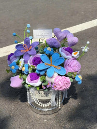 Hand-crocheted silver hugging bucket