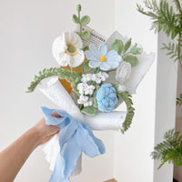 Handmade crocheted blue and white flower bouquet